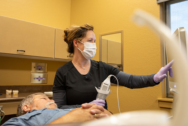 patient and doctor going through examination with procedure