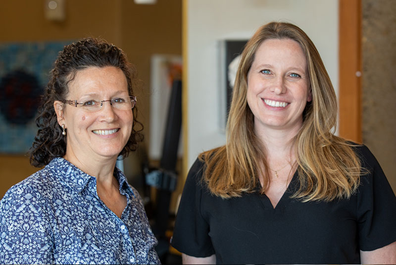 patient and doctor smiling after patient's procedure