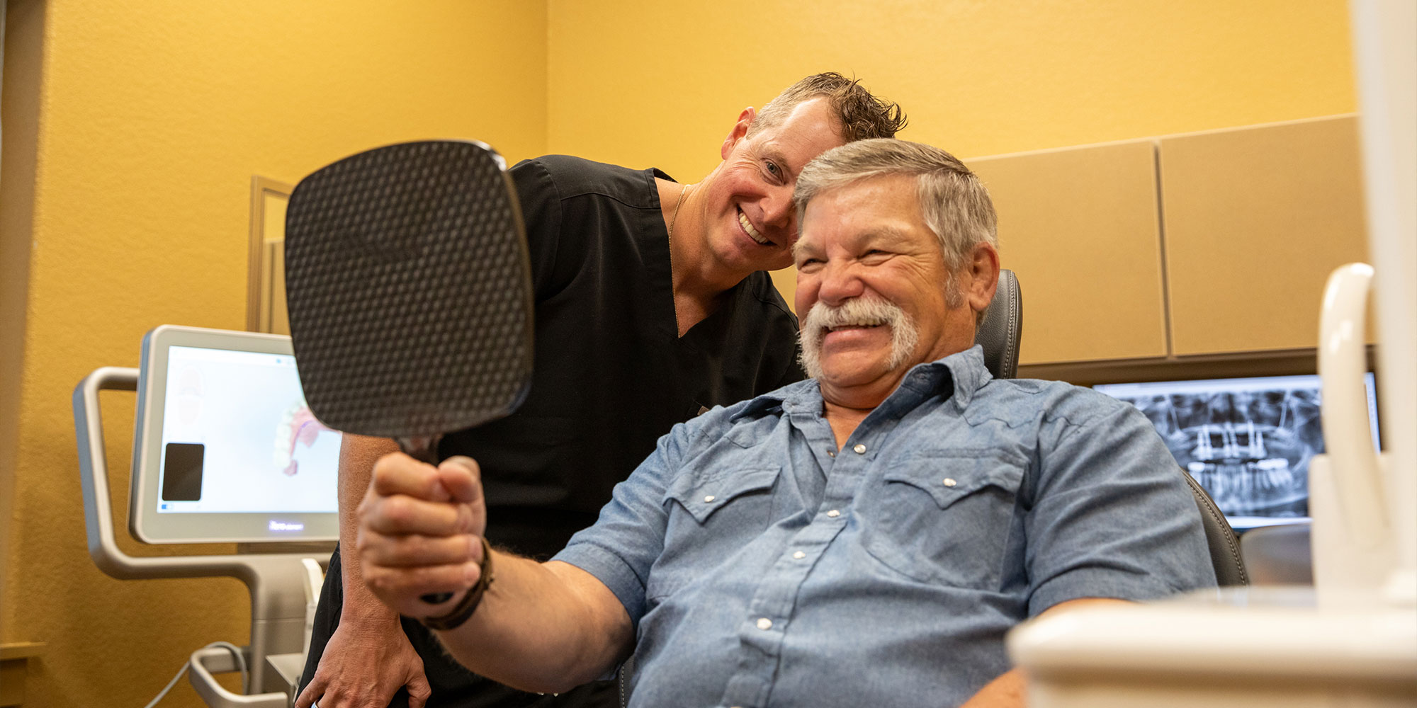 patient smiling confidentyl after their dental procedure